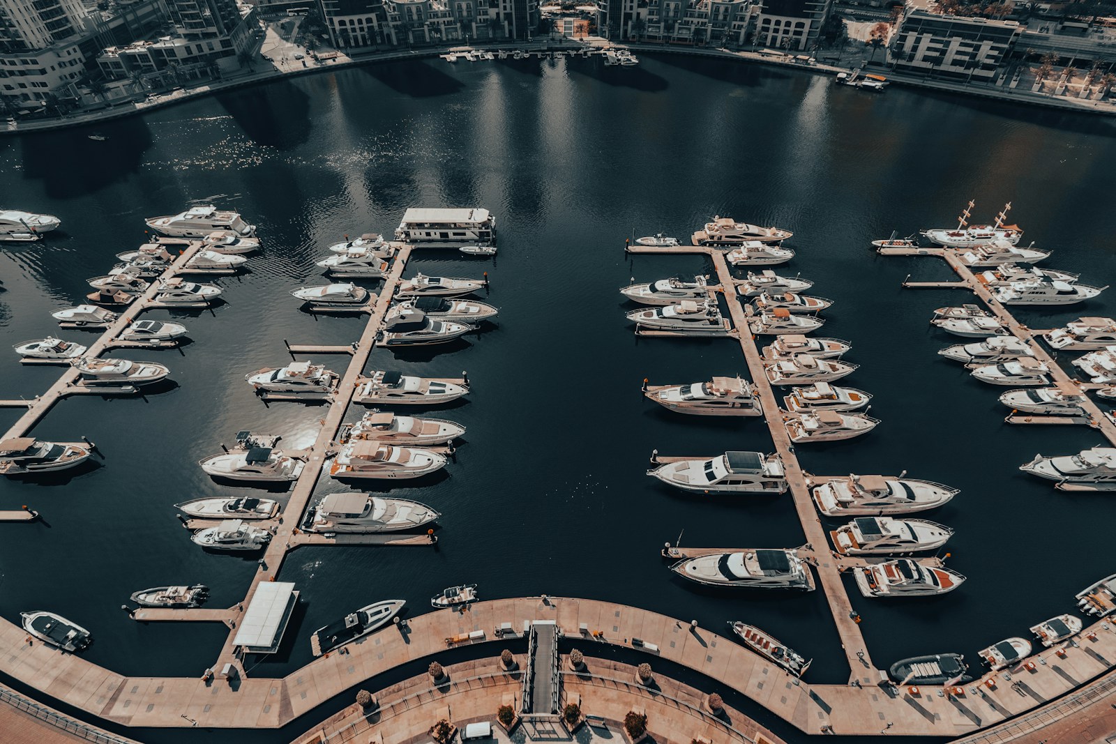 Aerial view of yachts and Dubai Marina waterfront